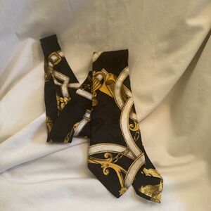 HERMES Black and Gold Jacquard Horse Bridle Tie Henri D’Origny